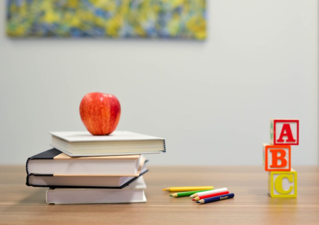 Books with Apple on top